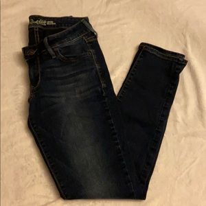 Dark wash low rise rockstar super skinny jeans